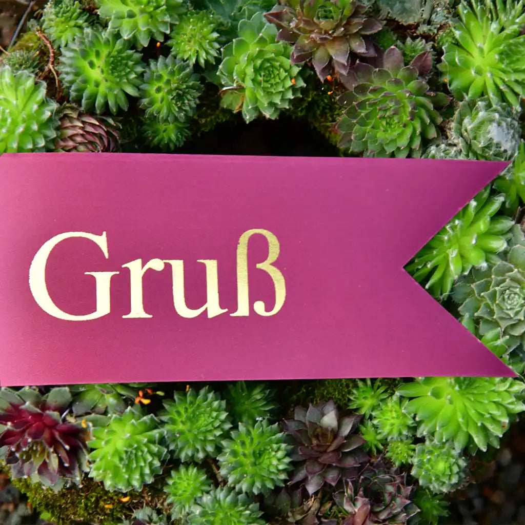 Schleife für den Trauerkranz in dunkelrot mit goldener Schrift